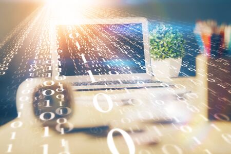 Double exposure of desktop computer and technology theme hologram. Concept of software development.