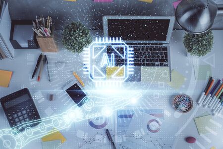 Double exposure of data drawing hologram over topview of study desk background with computer. Concept of Ai.の写真素材
