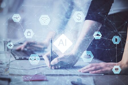 Double exposure of woman hands working on computer and data theme hologram drawing. Tech concept.の写真素材