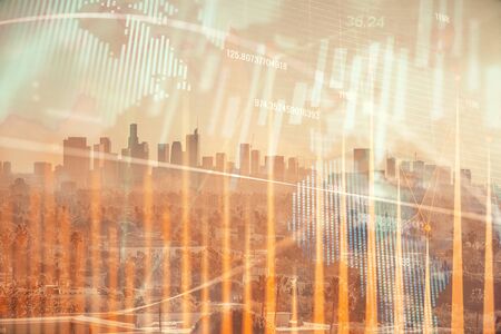 Forex chart on cityscape with skyscrapers wallpaper multi exposure. Financial research concept.の写真素材