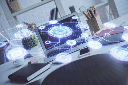 Computer on desktop with social network hologram. Multi exposure. Concept of international people connections.の写真素材