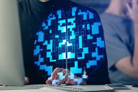 Multi exposure of data internet theme hologram with man working on computer on background. Concept...
