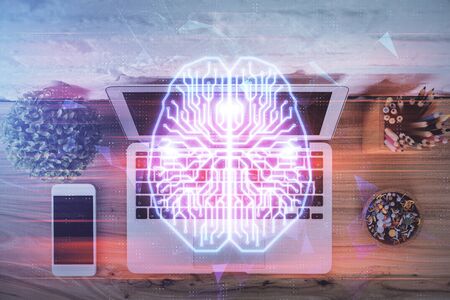 Multi exposure of brain sketch hologram over topview work table background with computer. Concept of...