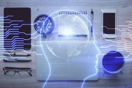 Double exposure of brain drawing over work table desktop. Top view. Global data analysis concept.