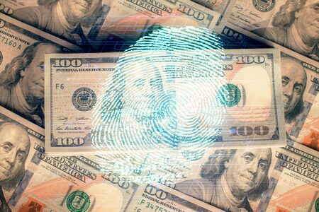 Double exposure of finger print scan drawing over usa dollars bill background. Concept of security of safe access.の写真素材