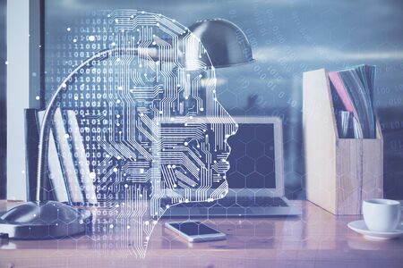 Multi exposure of work table with computer and brain hologram. Brainstorm concept.の写真素材