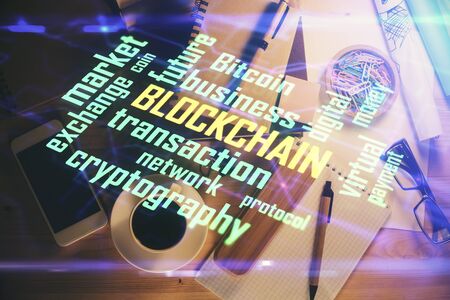 Multi exposure of crypto theme drawing and work table top veiw. Concept of blockchain technology in business.の写真素材