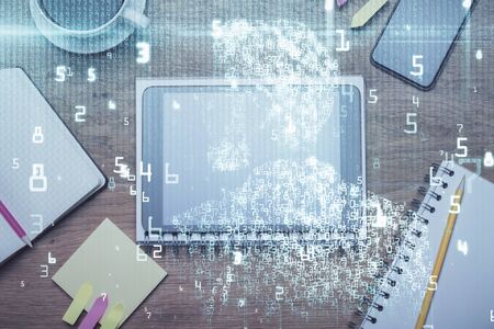 Double exposure of technology theme drawing over work table desktop. Top view. Global data analysis concept.の写真素材