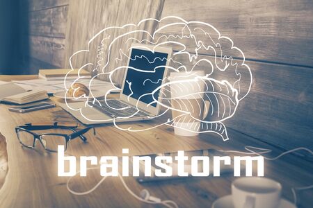 Desktop computer background in office and start up theme hologram drawing. Double exposure. Startup concept.の写真素材