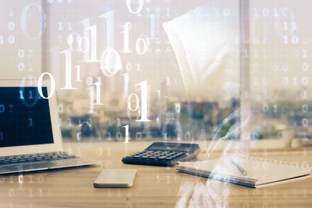Double exposure of desktop computer and technology theme hologram. Concept of software development.