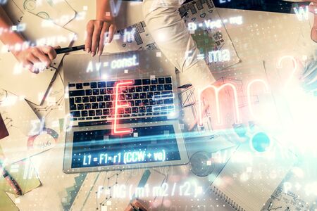 Double exposure of man and woman working together and math formulas hologram drawing. Education...