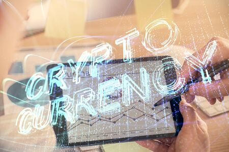 Double exposure of mans hands holding and using a phone and crypto currency blockchain theme drawing.の写真素材
