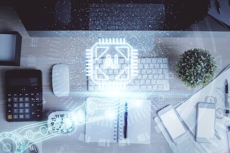 Multi exposure of data drawing hologram over topview of study desk background with computer. Concept...