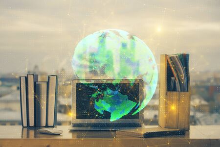 Computer on desktop with social network theme icon. Multi exposure. Concept of international...