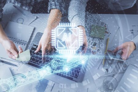 Double exposure of man and woman working together and data theme hologram drawing. Computer...