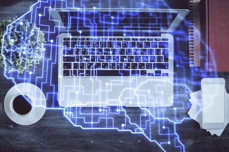 Double exposure of brain drawing hologram over topview work table background with computer. Concept of big data.の写真素材