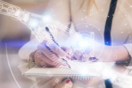 Multi exposure of womans writing hand on background with data technology hud. Big data concept.の写真素材