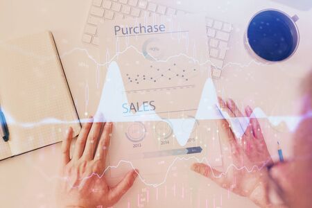 FOREX chart multi exposure with work table background. Top View. Concept of success.の写真素材