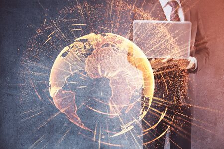 Media network theme hologram with man working on computer on background. Concept of internet communication. Double exposure.の写真素材