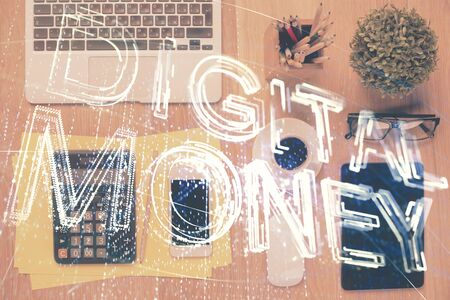 Double exposure of blockchain theme hologram over table with phone. Top view. Crypto technology concept.の写真素材