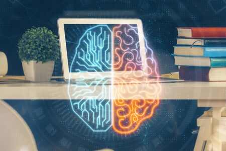 Double exposure of work space with computer and human brain drawing hologram. Brainstorm concept.