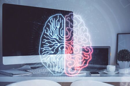 Double exposure of table with computer and brain hologram. Data innovation concept.の写真素材