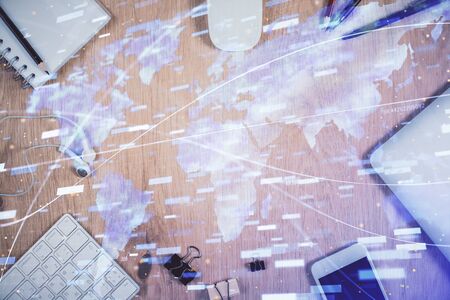 Multi exposure of technology theme drawing over work table desktop. Top view. Global data analysis concept.の写真素材