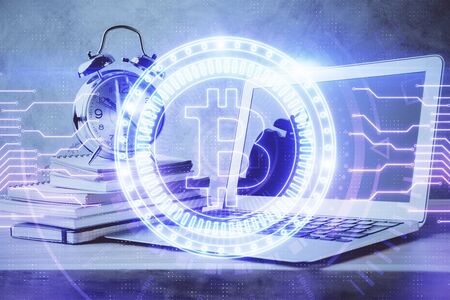Double exposure of blockchain and crypto economy theme hologram and table with computer background. Concept of bitcoin cryptocurrency.の写真素材