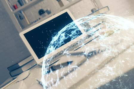 Computer on desktop with social network theme icon. Multi exposure. Concept of international connections.の写真素材