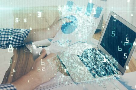 Multi exposure of technology hologram with man working on computer background. Concept of big data.の写真素材