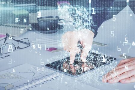 Double exposure of mans hand holding and using a digital device and data theme drawing. Technology...