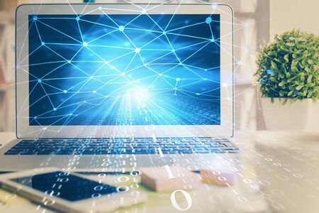 Multi exposure of desktop computer and technology theme hologram. Concept of software development.の写真素材