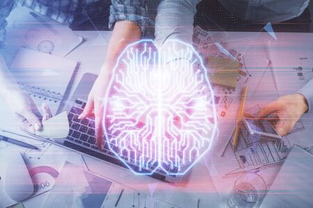 Double exposure of man and woman working together and human brain hologram drawing. Brainstorm concept. Computer background. Top View.の写真素材