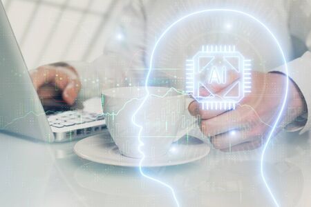 Man with computer background with brain theme hologram. Concept of brainstorm. Double exposure.