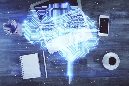 Multi exposure of brain sketch hologram over topview work table background with computer. Concept of...