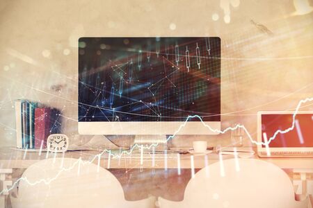 Multi exposure of stock market chart drawing and office interior background. Concept of financial analysis.の写真素材