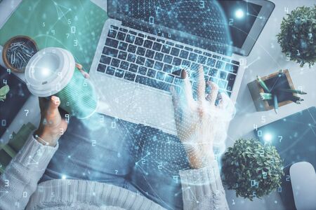 Double exposure of woman working on computer andhuman brain hologram drawing. Top View. Ai concept.