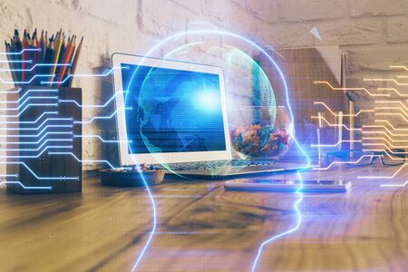 Double exposure of desktop computer and human brain drawing hologram. Ai concept.