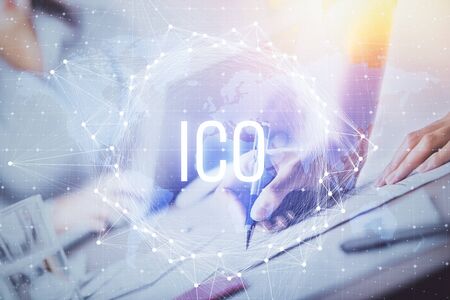 Cryptocurrency hologram over woman's hands writing background. Concept of blockchain. Multi exposure