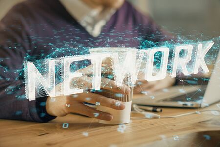 Double exposure of data internet theme hologram with man working on computer on background. Concept...