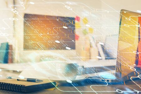 Multi exposure of desktop computer and technology theme hologram. Concept of software development.