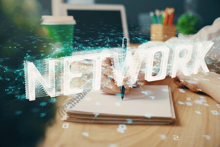 Multi exposure of writing hands on background with data solution hologram. Technology concept.の写真素材