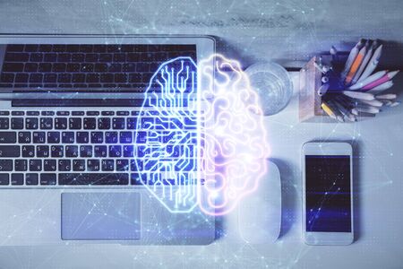 Multi exposure of brain sketch hologram over topview work table background with computer. Concept of...