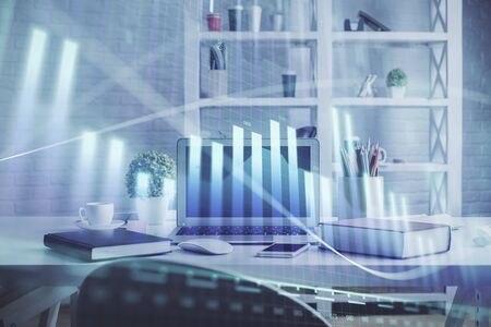 Double exposure of financial graph drawing and office interior background. Concept of stock market.の写真素材