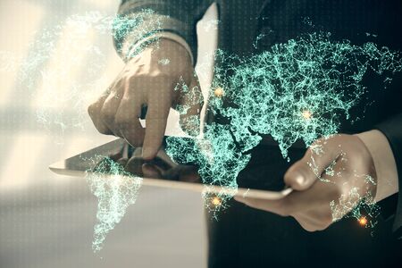 Double exposure of mans hands holding and using a phone and social network theme drawing.の写真素材