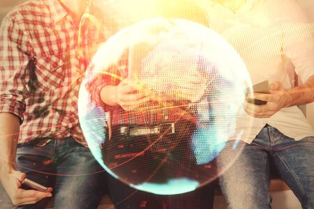 Double exposure of business theme drawing and man and woman working together holding and using a mobile device.の写真素材