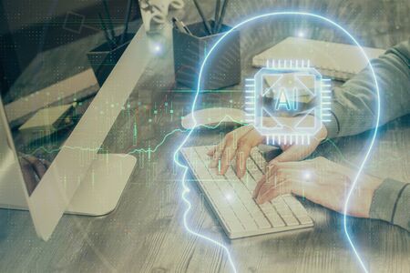 Man with computer background with brain theme hologram. Concept of brainstorm. Double exposure.