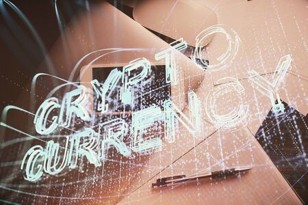 Double exposure of blockchain theme hologram over table with phone. Top view. Crypto technology concept.の写真素材