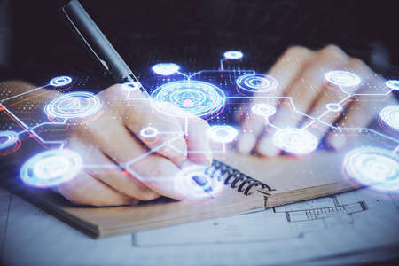 Social network theme hologram over womans hands writing background. Concept of international people...
