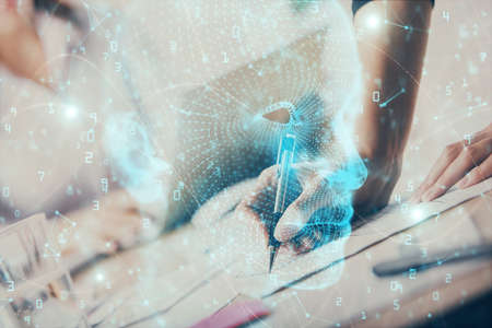 Double exposure of womans writing hand on background with brain hud. Concept of learning.の写真素材
